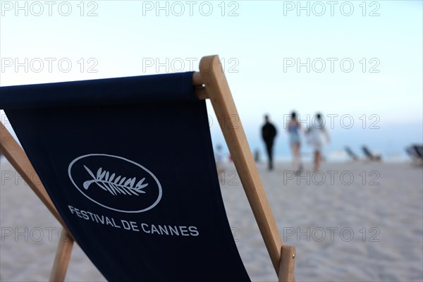 Cannes, France, 13.5.2024: Deckchairs with the inscription Festival de Cannes stand on the beach