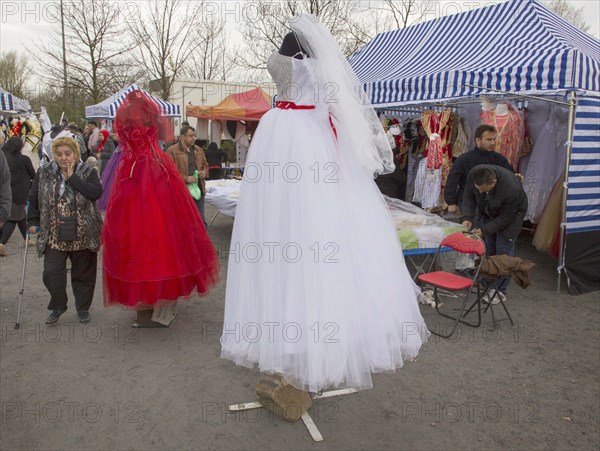 A Turkish stall offers wedding dresses at the flea market in Gelsenkirchen, on 12/04/2015,