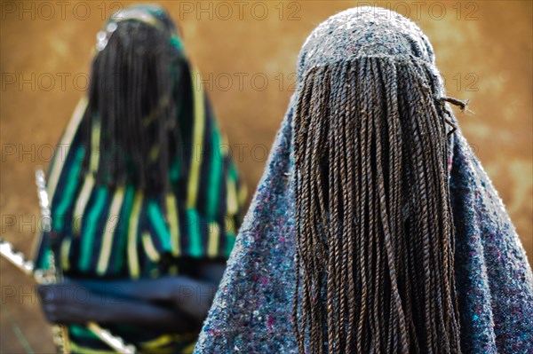 Teenage boys following their initiation rite, portrait of teens from the Pokot tribe, Kenya. Once