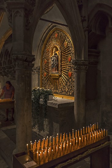 Madonna in a halo in the Sailer Chapel, sacrificial candles in front, St Peter's Cathedral,