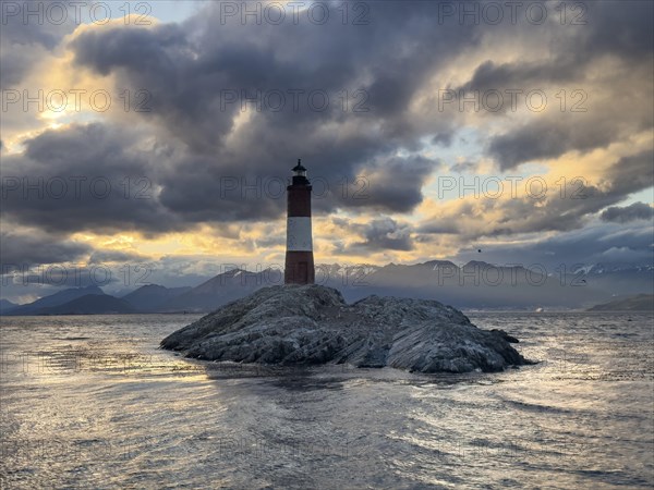 Lighthouse Faro Les Eclaireurs at sunset, dramatic clouds, Beagle Channel, Tierra del Fuego, Tierra