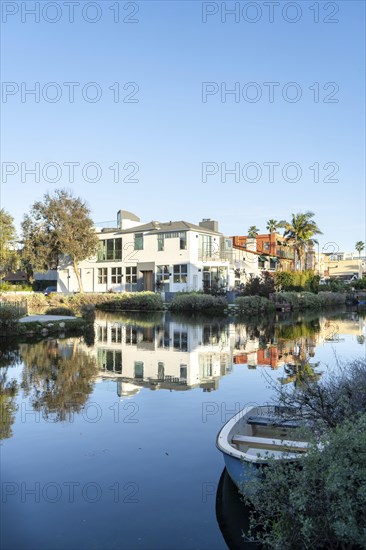 Houses along Venice Canal, Los Angeles, California. Vertical shot