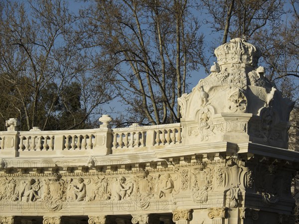 Close-up of an ornate stone balustrade with reliefs and decorative elements, Madrid, Spain, Europe