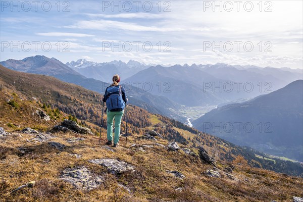 Mountaineer in the mountains in autumn, Venet crossing, Oetztal Alps, Tyrol, Austria, Europe
