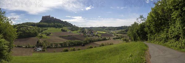 Field path at the edge of the forest, meadows, fields, arable land, Riegersburg Castle in the