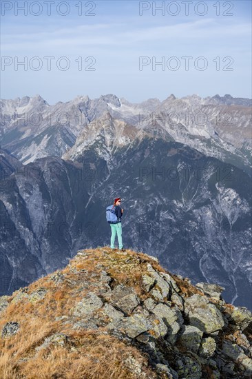 Mountaineer in the mountains in autumn, Venet crossing, Oetztal Alps, Tyrol, Austria, Europe