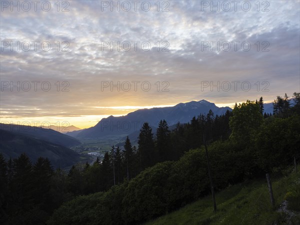 Sunset over the Eisenerz Alps, mountain massif Reiting, in the Liesingtal the village Traboch, view
