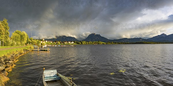 Rainbow, Hopfensee, behind it Hopfen am See and Ammergau Alps, near Fuessen, Ostallgaeu, Allgaeu,