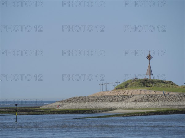 Dune landscape with metal structure and sea in the background, Baltrum Germany