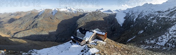 Mountain panorama and glacier, mountain hut Ramolhaus in autumn with snow, view of Gurgler Ferner