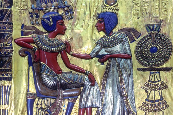Throne of Pharaoh Tutankhamun, the backrest shows his woman Ankh-Sun-Amun anointing her man,