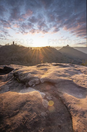 View of Trifels Castle, from Engels Landing rock, with the young tower in autumn at sunset.