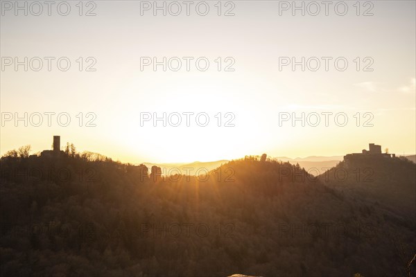 View of Trifels Castle, from Engels Landing rock, with the young tower in autumn at sunset.