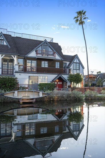 Venice Canal and its picturesque houses, located in Los Angeles, California. Vertical shot