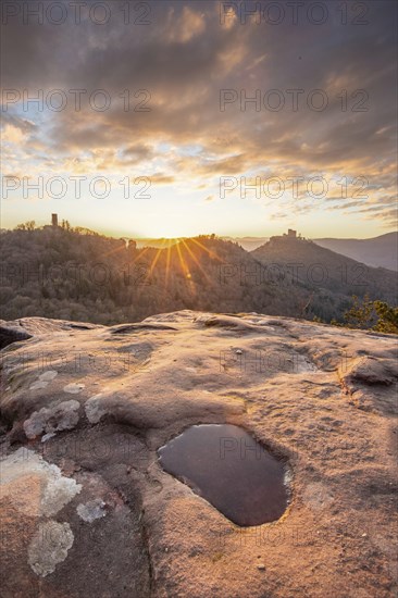 View of Trifels Castle, from Engels Landing rock, with the young tower in autumn at sunset.
