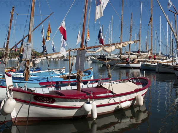 Close-up of sailing boats in the harbour against a blue sky, la seyne sur mer on the mediterranean