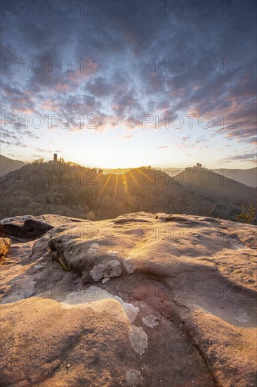 View of Trifels Castle, from Engels Landing rock, with the young tower in autumn at sunset.