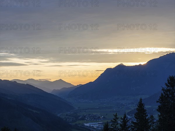 Sunset over the Eisenerz Alps, mountain massif Reiting, in the Liesingtal the village Traboch, view