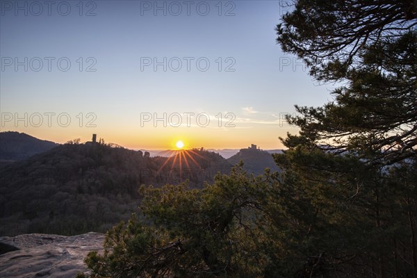View of Trifels Castle, from Engels Landing rock, with the young tower in autumn at sunset.