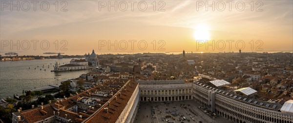 Panorama, St Mark's Square and Basilica di Santa Maria della Salute on the Grand Canal at sunset,