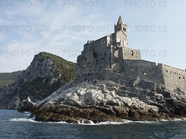 Medieval castle on a cliff, with sea and sky in the background, Bari, Italy, Europe