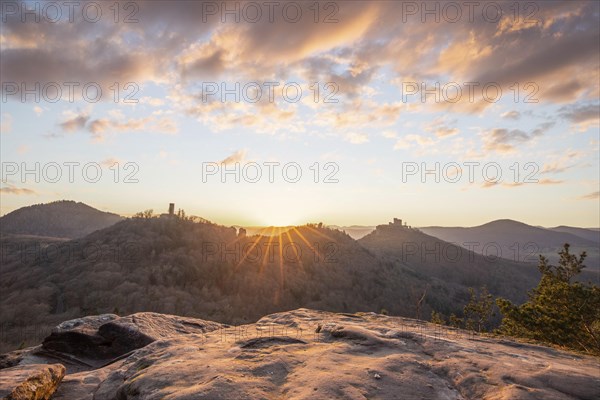 View of Trifels Castle, from Engels Landing rock, with the young tower in autumn at sunset.