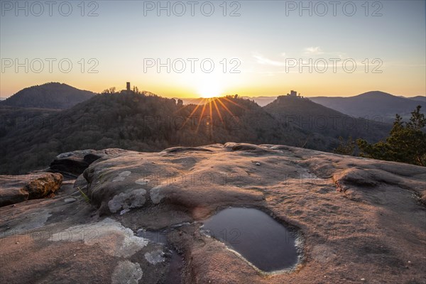 View of Trifels Castle, from Engels Landing rock, with the young tower in autumn at sunset.