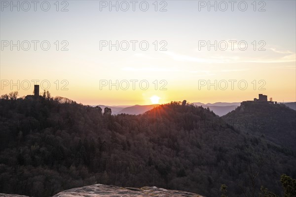 View of Trifels Castle, from Engels Landing rock, with the young tower in autumn at sunset.