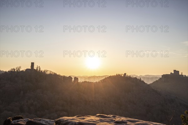 View of Trifels Castle, from Engels Landing rock, with the young tower in autumn at sunset.