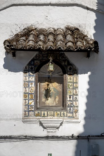 Madonna painting on a house wall, Arcos, Andalusia, Spain, Europe