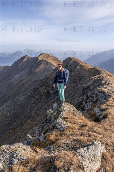Mountaineer in the mountains in autumn, Venet crossing, Oetztal Alps, Tyrol, Austria, Europe