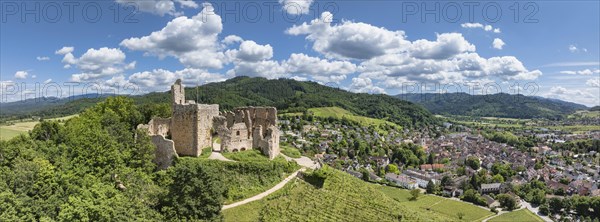 Aerial view, panorama of Staufen Castle, on a vineyard, Schlossberg, Staufen im Breisgau,