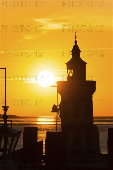 Pingelturm, historical lighthouse, picturesque, golden, beautiful sunset, silhouette in front of