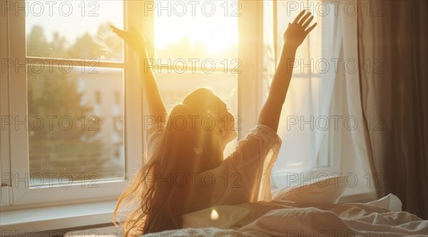 A woman is in bed, smiling and stretching her arms after waking up at sunrise early morning, AI