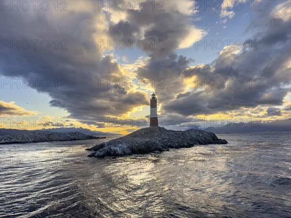 Lighthouse Faro Les Eclaireurs at sunset, dramatic clouds, Beagle Channel, Tierra del Fuego, Tierra
