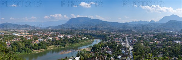 Panorama over Luang Prabang with Nam Khan River and Wat Phol Pao in the background, Laos, Asia