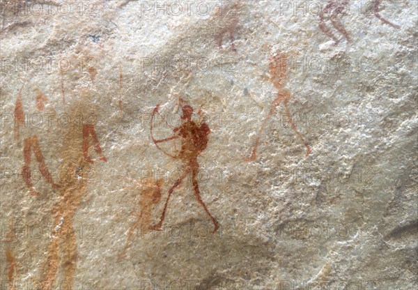 Prehistoric depiction of various people at the Ja, archer, San rock paintings, Sevilla Art Rock