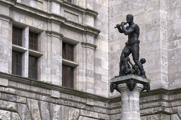 Flute player on town hall fountain, also known as Pied Piper fountain, Leipzig, Saxony, Germany,