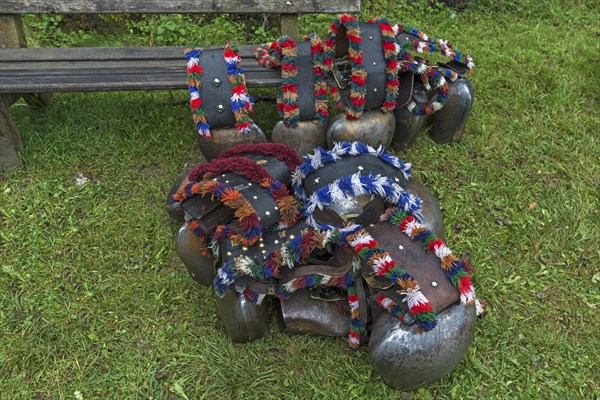 Cow jewellery bells, put together for the Almabtrieb, gabled house, Bad Hindelang, Allgaeu,