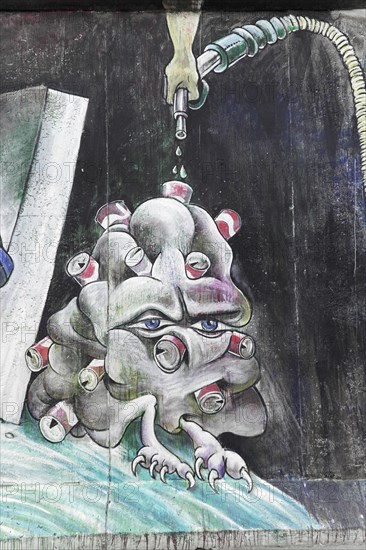 Graffiti on the Berlin Wall in the East Side Gallery, Berlin, Germany, Europe, Eerie plant-like