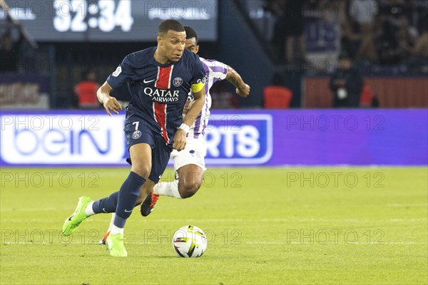 Football match, captain Kylian MBAPPE' Paris St. Germain running on the ball to the right, Cristian