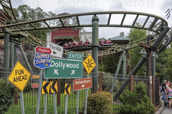 Road sign display for the Summer Celebrationin front of the FireChaser roller coaster ride in the