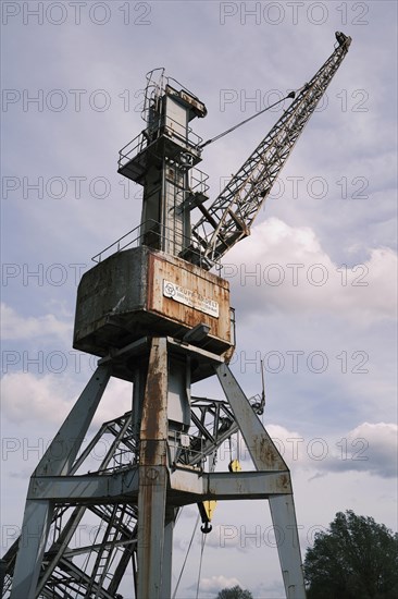 Old crane in Hamburg harbour, harbour museum, vintage, Hanseatic City of Hamburg, Hamburg, Germany,