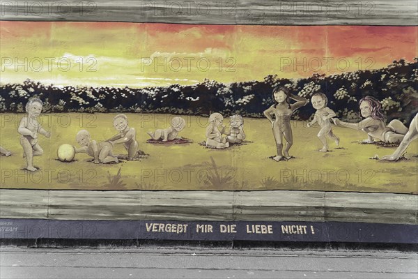 Graffiti on the Berlin Wall at the East Side Gallery, Berlin, Germany, Europe, A peaceful graffiti