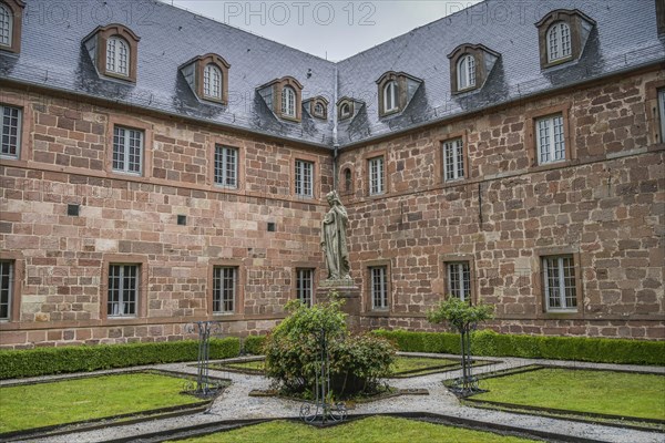 Inner courtyard with figure of St Odilia, Hohenburg Monastery, Odilienberg, Alsace, France, Europe