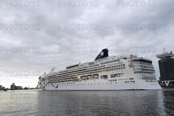 The medium-sized cruise ship the Norwegian Dawn, a ship belonging to the Norwegian Cruise Line,