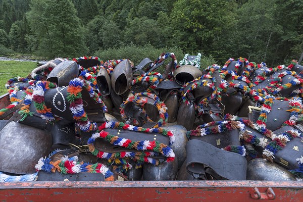 Jewellery cowbells for the cattle drive on a hanger, gabled house, Bad Hindelang, Allgaeu, Bavaria,