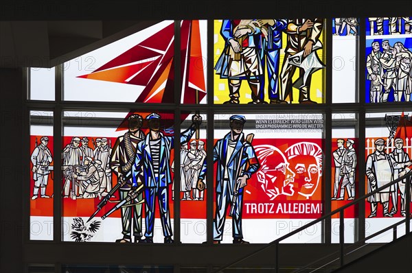Interior photograph, stained glass window, Communist propaganda art, Rosa Luxemburg and Karl