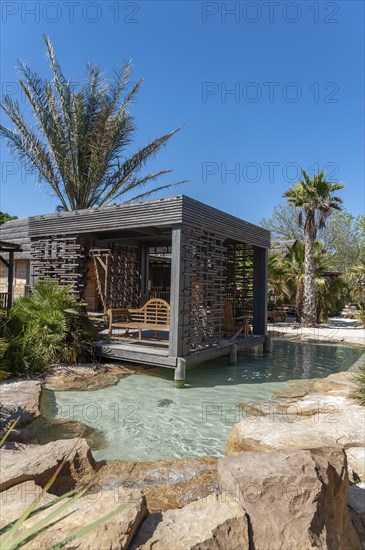Modern wooden architecture in the holiday home development on the Plage de Port Grimaud beach, Port