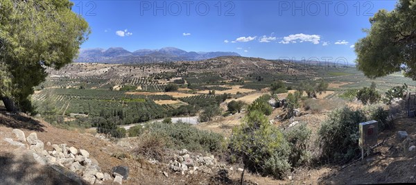 View from Phaistos palace hill to fertile Messara plain plain of Messara with many olive
